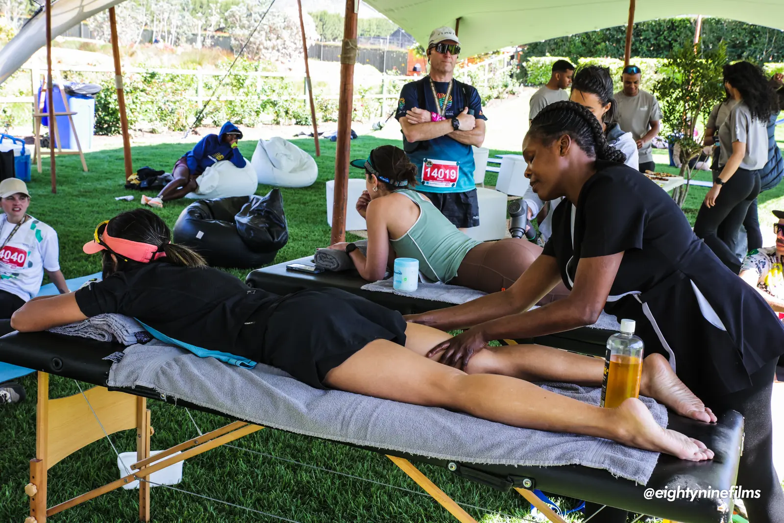 Runners in compression boots in the recovery zone